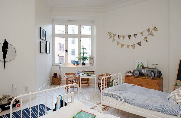 Натуральные материалы и яркие детали – детская комната в скандинавском стиле